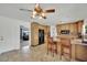 Eat-in kitchen has granite counters, a center island, and an open design perfect for modern living at 3681 S Rosecrest Cir, Las Vegas, NV 89121
