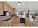 Kitchen with granite countertops and stainless steel appliances at 3681 S Rosecrest Cir, Las Vegas, NV 89121