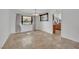 Bright living room featuring tile floor, natural light, and neutral decor at 3681 S Rosecrest Cir, Las Vegas, NV 89121