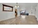 Open-concept living space with travertine floors, bright light and neutral decor at 3681 S Rosecrest Cir, Las Vegas, NV 89121