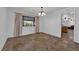 Empty living room features tile flooring and natural light at 3681 S Rosecrest Cir, Las Vegas, NV 89121