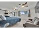 Spacious bedroom with a large window and comfortable seating at 3681 S Rosecrest Cir, Las Vegas, NV 89121