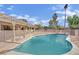 Inviting pool with lounging area and desert landscaping, perfect for outdoor relaxation at 3681 S Rosecrest Cir, Las Vegas, NV 89121