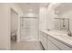 This bathroom offers a tile floor, a shower with glass doors and a double sink vanity at 3693 Canis Minor Ln # 13101, Henderson, NV 89052