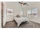 Bright bedroom features a neutral color palette, two windows and plush carpet at 3693 Canis Minor Ln # 13101, Henderson, NV 89052
