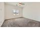 The cozy bedroom features a ceiling fan, plush carpet and a window for lots of natural light at 3693 Canis Minor Ln # 13101, Henderson, NV 89052