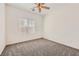Cozy bedroom with neutral carpet, a window, and plenty of natural light at 3693 Canis Minor Ln # 13101, Henderson, NV 89052