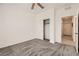 Bright bedroom featuring neutral paint, carpet and a ceiling fan with an en-suite bathroom nearby at 3693 Canis Minor Ln # 13101, Henderson, NV 89052