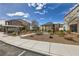 Community area with picnic tables and native landscaping at 3693 Canis Minor Ln # 13101, Henderson, NV 89052