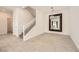 This home has a large mirror on the wall across from the stairs at 3693 Canis Minor Ln # 13101, Henderson, NV 89052