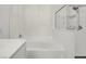 Bathroom featuring bathtub and enclosed shower with modern fixtures at 3975 N Hualapai Way # 235, Las Vegas, NV 89129