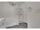 Bathroom featuring bathtub and shower, modern fixtures, and bright decor at 3975 N Hualapai Way # 235, Las Vegas, NV 89129