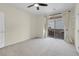 Clean bedroom features an outdoor balcony and sliding glass door at 3975 N Hualapai Way # 235, Las Vegas, NV 89129