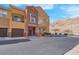 Charming home boasts a two car garage, desert landscaping, and a private patio at 3975 N Hualapai Way # 235, Las Vegas, NV 89129
