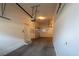 Spacious two car garage with garage door and storage at 3975 N Hualapai Way # 235, Las Vegas, NV 89129