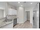 Well-lit kitchen featuring stainless steel appliances and granite countertops at 3975 N Hualapai Way # 235, Las Vegas, NV 89129