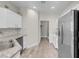Bright kitchen featuring stainless steel appliances, and wood flooring at 3975 N Hualapai Way # 235, Las Vegas, NV 89129