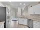 Bright kitchen features stainless steel appliances, granite countertops, and hardwood floors at 3975 N Hualapai Way # 235, Las Vegas, NV 89129