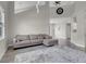Large living room featuring a sectional sofa, ceiling fan and open layout at 3975 N Hualapai Way # 235, Las Vegas, NV 89129
