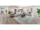 Large living room boasts a modern design, ample seating, and plenty of space at 401 Lacy Ln, Las Vegas, NV 89107