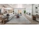 Spacious living room with fireplace, a large sectional, and plenty of natural light at 401 Lacy Ln, Las Vegas, NV 89107