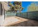 Backyard features a patio with wood fence at 4032 Great Plains Way, Las Vegas, NV 89121