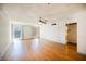 A spacious living room filled with natural light and hardwood floors at 4032 Great Plains Way, Las Vegas, NV 89121