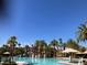 Expansive community pool area offering a resort-like experience with lush landscaping and serene views at 405 Center Green Dr, Las Vegas, NV 89148
