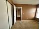 A carpeted bedroom featuring neutral walls, a closet and a window at 45 Maleena Mesa St # 1921, Henderson, NV 89074