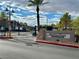 Community entrance sign for Traverse Point Condominiums with lush landscaping at 45 Maleena Mesa St # 1921, Henderson, NV 89074
