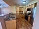 Updated kitchen featuring stainless steel appliances and wooden cabinets at 45 Maleena Mesa St # 1921, Henderson, NV 89074