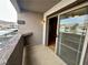 Outdoor patio featuring a sliding glass door and view of neighborhood at 45 Maleena Mesa St # 1921, Henderson, NV 89074