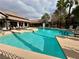 Resort-style pool with clear blue water, lounge chairs, and well-maintained surroundings at 45 Maleena Mesa St # 1921, Henderson, NV 89074