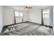 Bright bedroom with a ceiling fan and large window at 4727 Agave Cactus St, North Las Vegas, NV 89031