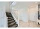 Hallway with stairs, access to the kitchen, and a closet at 4727 Agave Cactus St, North Las Vegas, NV 89031
