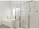 Bathroom showcasing a walk-in shower and soaking tub at 5577 Golden Leaf Ave, Las Vegas, NV 89122
