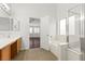 Bathroom featuring a soaking tub and walk-in shower at 5577 Golden Leaf Ave, Las Vegas, NV 89122