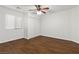 Bedroom featuring wood floors, ceiling fan, and closet at 5577 Golden Leaf Ave, Las Vegas, NV 89122