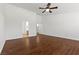 Bright bedroom featuring wood flooring and ceiling fan at 5577 Golden Leaf Ave, Las Vegas, NV 89122