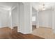 Bright foyer with tile and hardwood floors, leading to multiple rooms at 5577 Golden Leaf Ave, Las Vegas, NV 89122