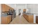 Kitchen features stainless steel appliances, granite countertops, and tile floors at 5577 Golden Leaf Ave, Las Vegas, NV 89122