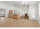 Open kitchen with stainless appliances and breakfast bar at 5577 Golden Leaf Ave, Las Vegas, NV 89122