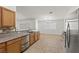 Kitchen featuring stainless steel appliances and tile backsplash at 5577 Golden Leaf Ave, Las Vegas, NV 89122