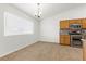 Eat-in kitchen with stainless steel appliances and bright natural light at 5577 Golden Leaf Ave, Las Vegas, NV 89122