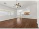 Open living room features hardwood floors and lots of natural light at 5577 Golden Leaf Ave, Las Vegas, NV 89122