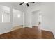 Bright and open living room features hardwood flooring and neutral paint at 5577 Golden Leaf Ave, Las Vegas, NV 89122