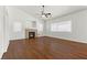 Spacious living room boasting a cozy fireplace and hardwood floors at 5577 Golden Leaf Ave, Las Vegas, NV 89122