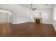 Large, bright living room offers a fireplace and hardwood floors at 5577 Golden Leaf Ave, Las Vegas, NV 89122