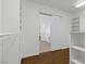 Walk-in closet with shelving and laminate flooring at 5577 Golden Leaf Ave, Las Vegas, NV 89122