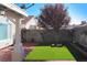 Backyard featuring a decorative tree, low maintenance yard, and block wall at 6705 Old Newbury Ave, Las Vegas, NV 89108